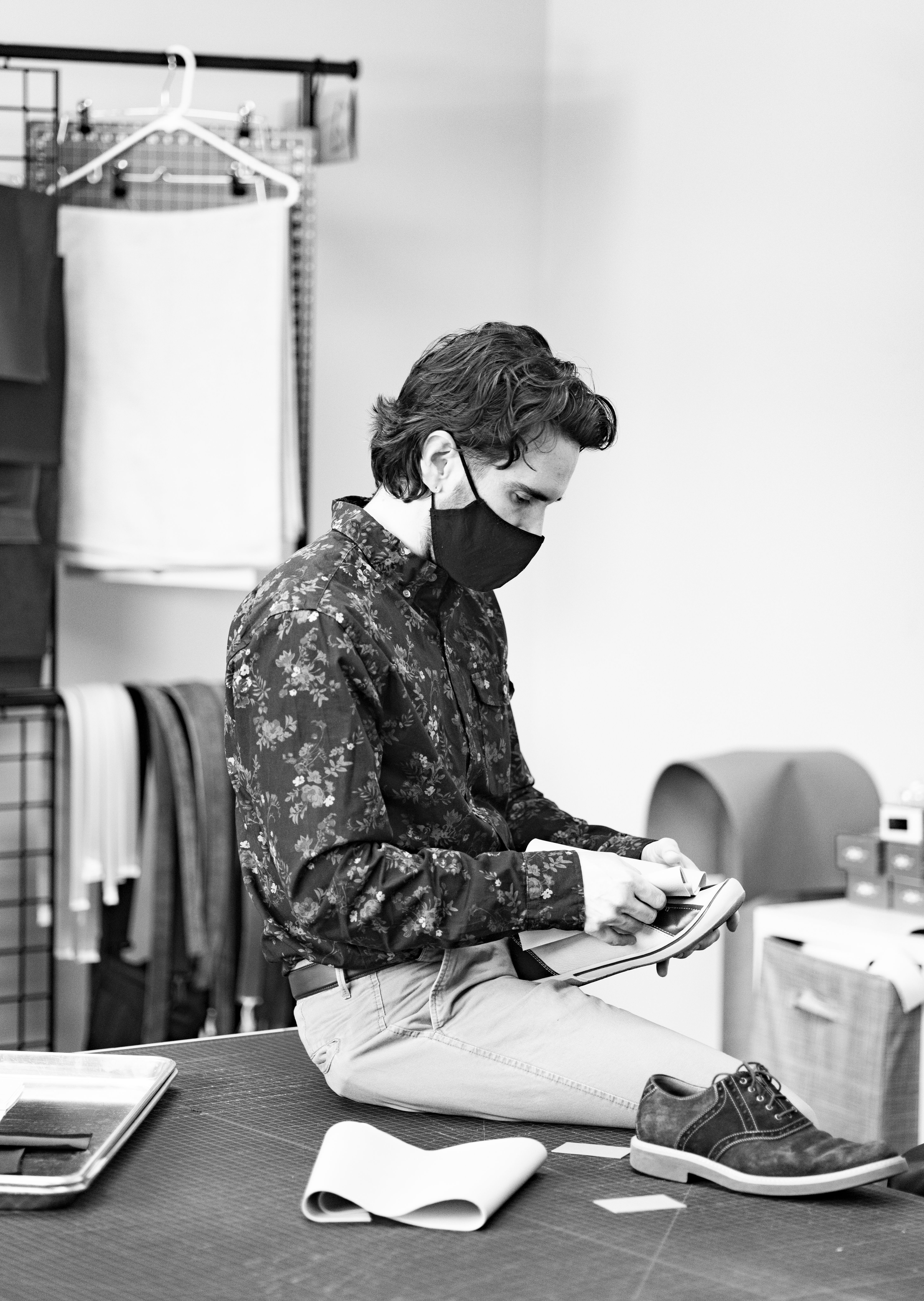 Alan Lugo working on a shoe